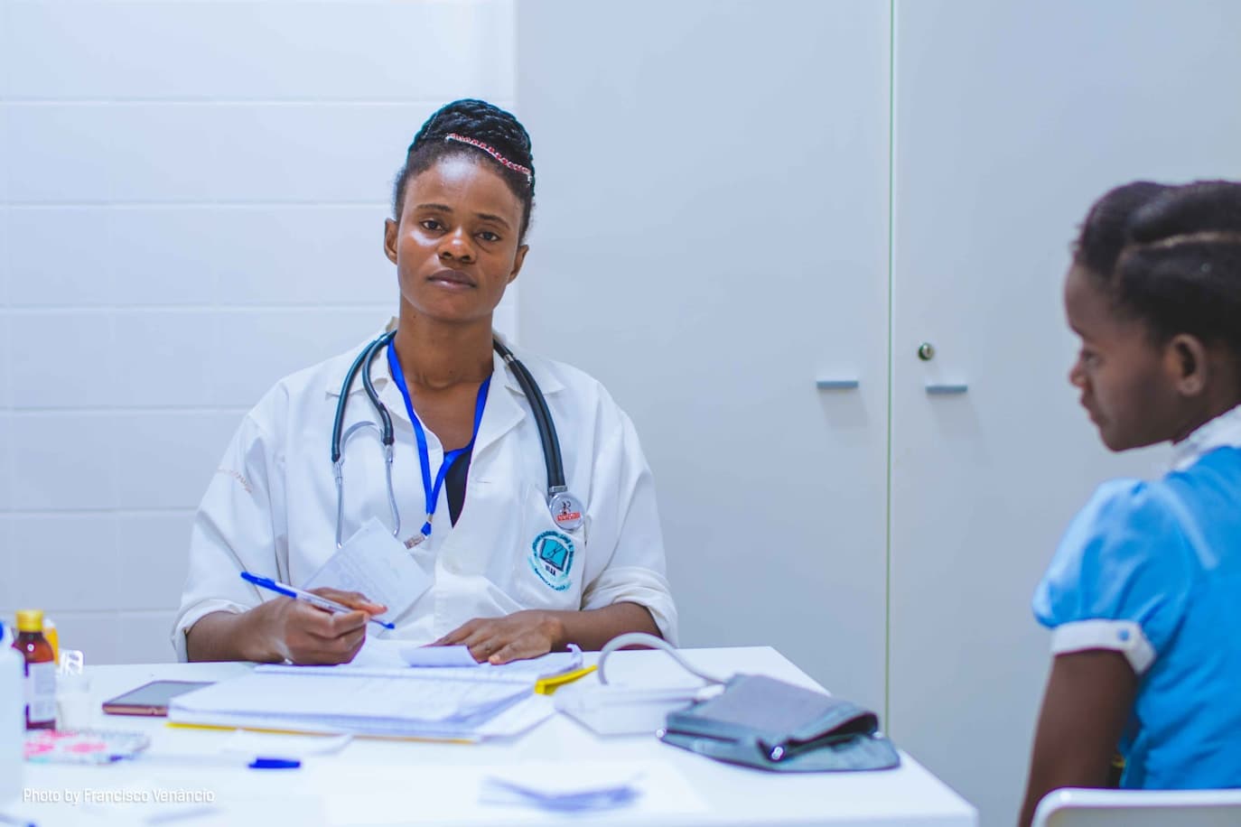 A doctor consulting with a patient